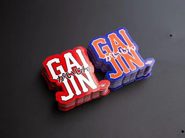 Custom die-cut stickers in two color variants